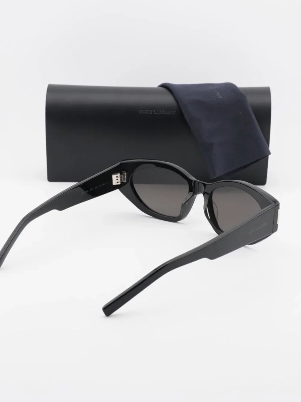 Saint Laurent SL638 001 Oval Sunglasses - Black / Black